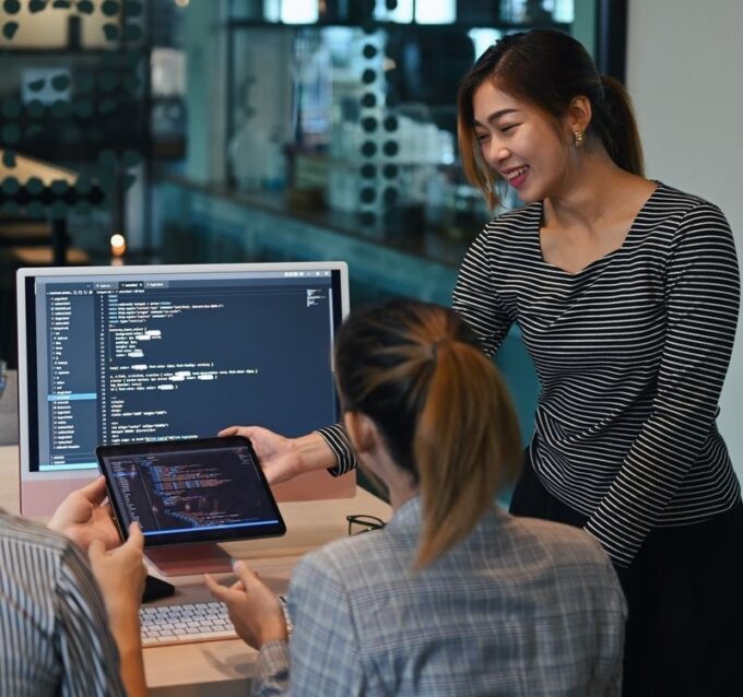 Female project supervisor explaining detail of pro
